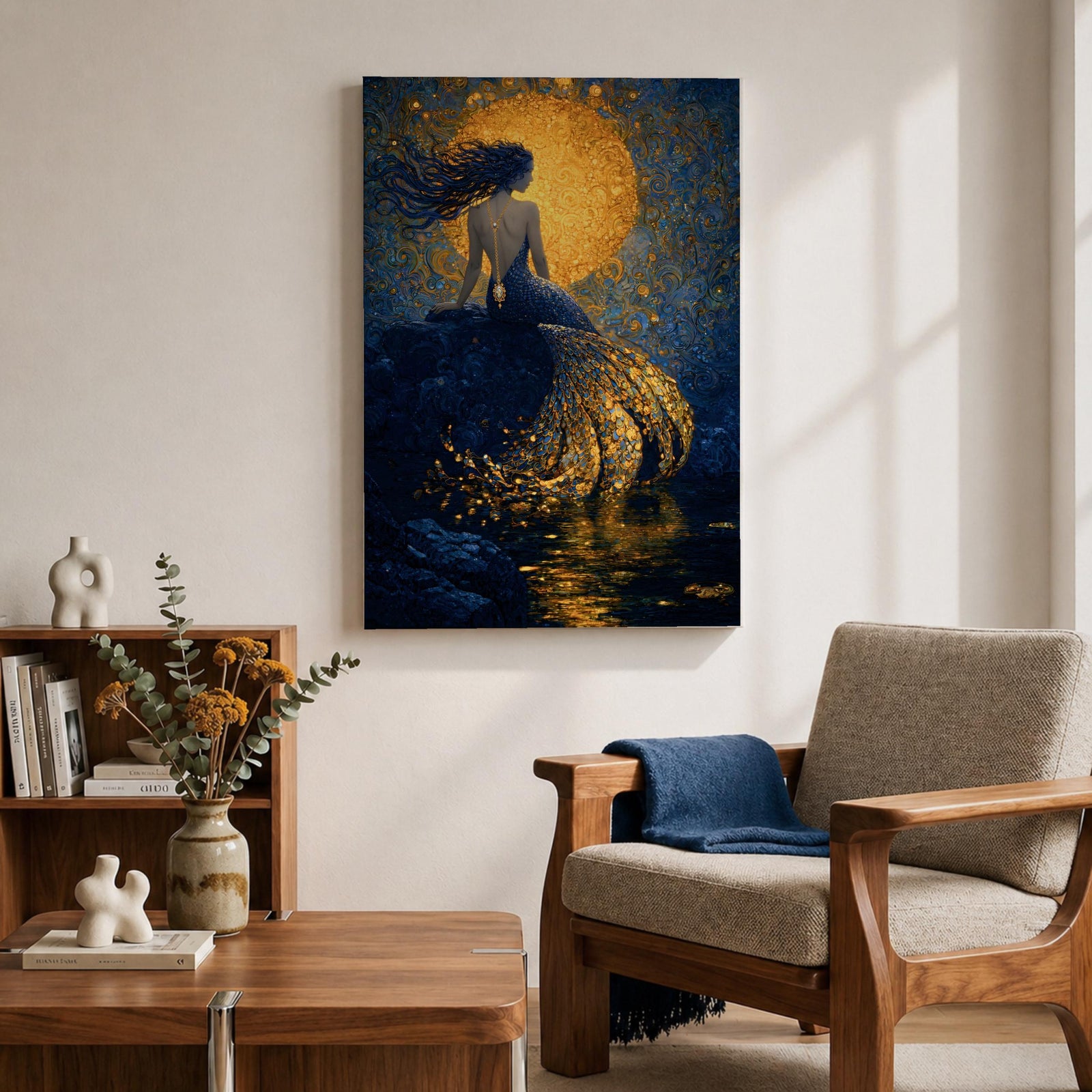 A rich fantasy painting of a mermaid seated on a rocky shore beneath a glowing golden moon, her long flowing hair swept to the side as her detailed tail shimmers with layered gold scales cascading into reflective water, set against deep blue swirling textures that create a dramatic and luminous ocean mythology scene.