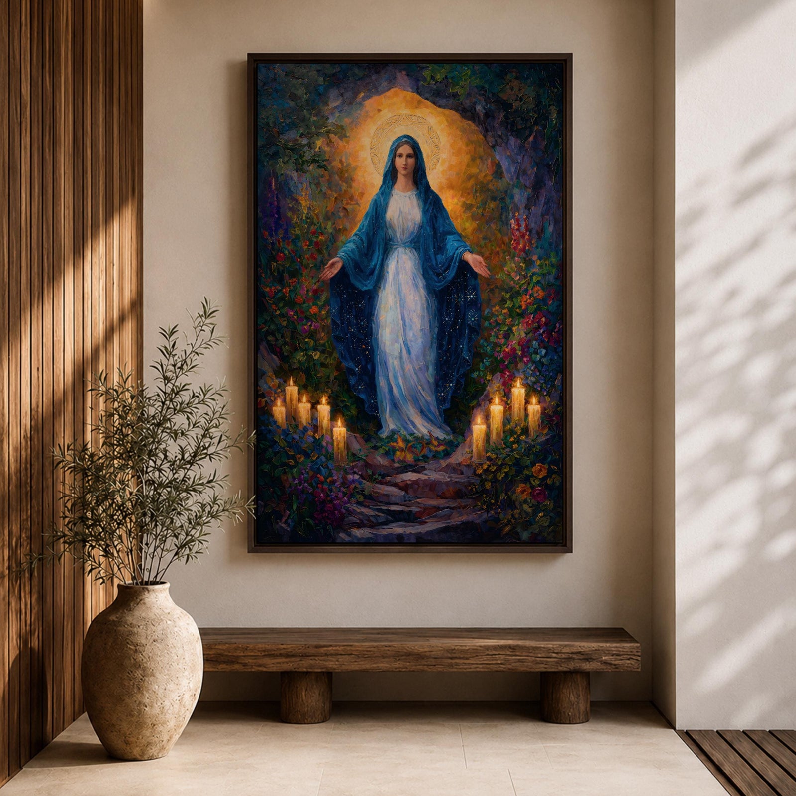 A framed canvas painting of Our Lady of Lourdes depicts the Virgin Mary standing with open arms surrounded by glowing candles and vibrant flowers, rendered in a richly detailed, realistic style with a luminous halo behind her head, evoking a serene and reverent atmosphere.