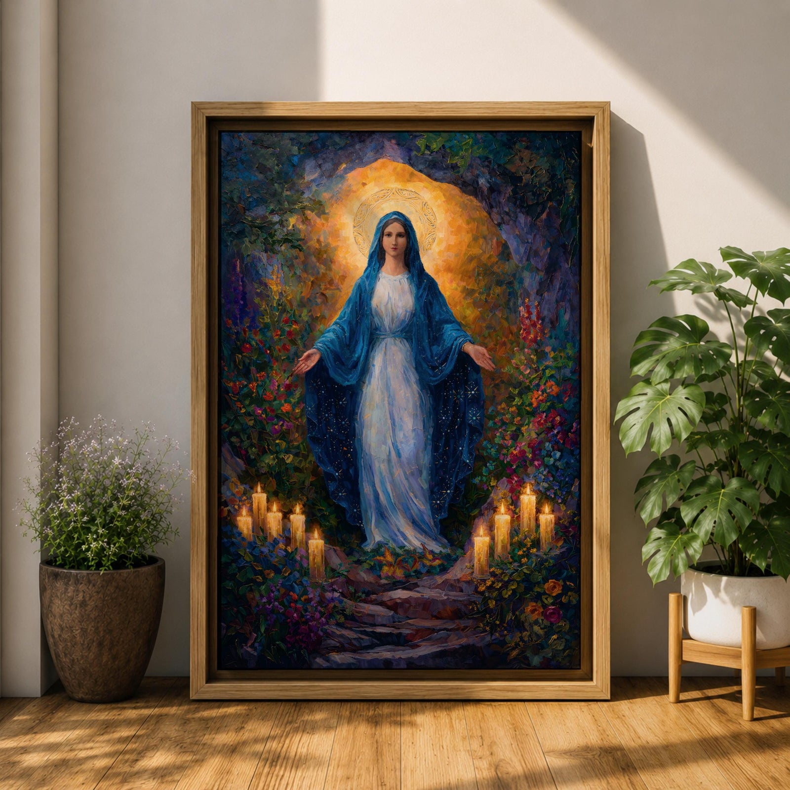A framed canvas painting of Our Lady of Lourdes depicts the Virgin Mary standing with open arms surrounded by glowing candles and vibrant flowers, rendered in a richly detailed, realistic style with a luminous halo behind her head, evoking a serene and reverent atmosphere.