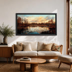 A panoramic painting of a calm lake reflecting autumn trees and a soft sunset sky, with warm earthy tones and bare branches lining the water, rendered in a realistic impressionistic style across a wide landscape composition.
