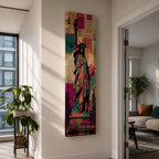 A tall narrow artwork of the Statue of Liberty holding a torch and tablet, rendered in bold stylized colors with layered collage textures of vintage newspaper clippings, featuring vibrant teal, magenta, and gold tones with graphic outlines in a modern pop art inspired cityscape style.