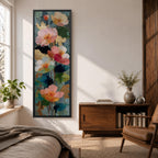 A tall, narrow vertical painting of soft pastel poppy flowers in shades of blush pink, coral, cream, and muted yellow, layered with textured brushstrokes and accented by hints of gold against a cool blue abstract background, with delicate stems and leaves creating a balanced contemporary floral composition.