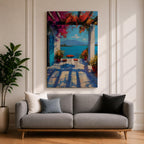 Vibrant Mediterranean patio wall art featuring a sunlit terrace with colorful bougainvillea, a café table and chairs, and a breathtaking blue lake view framed by white columns. Impressionist coastal artwork with rich colors, relaxing vacation ambiance, and European seaside charm.