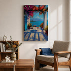 Vibrant Mediterranean patio wall art featuring a sunlit terrace with colorful bougainvillea, a café table and chairs, and a breathtaking blue lake view framed by white columns. Impressionist coastal artwork with rich colors, relaxing vacation ambiance, and European seaside charm.