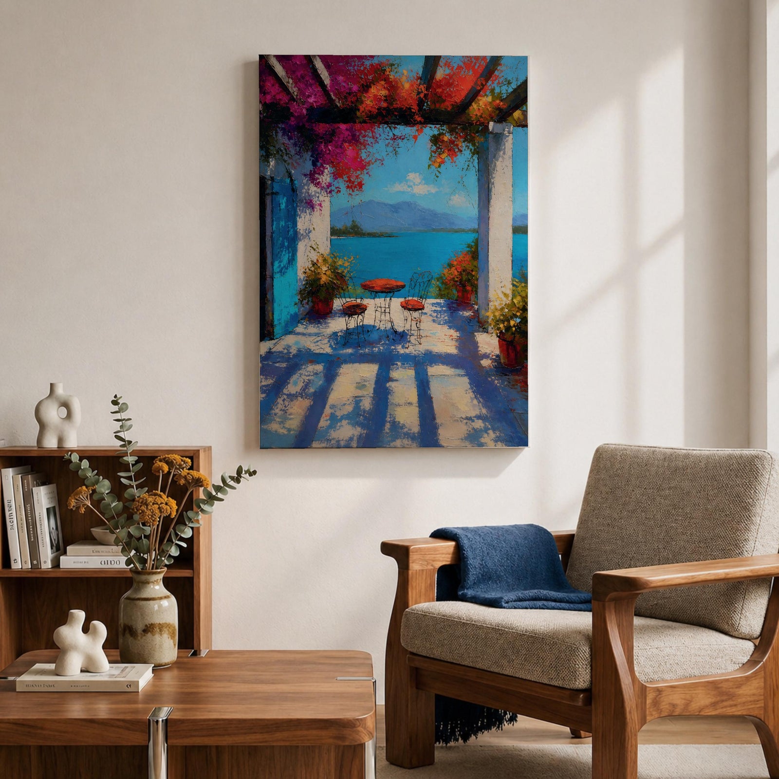 Vibrant Mediterranean patio wall art featuring a sunlit terrace with colorful bougainvillea, a café table and chairs, and a breathtaking blue lake view framed by white columns. Impressionist coastal artwork with rich colors, relaxing vacation ambiance, and European seaside charm.