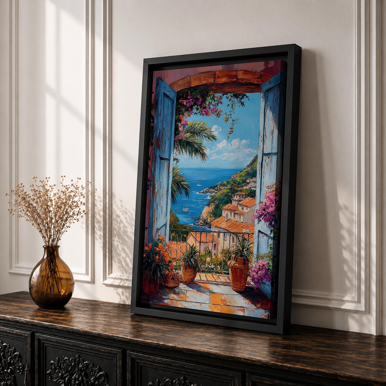 Colorful Mediterranean coastal village seen through open blue shutters overlooking a sparkling sea. Terracotta rooftops, blooming flowers, palm trees, and boats create a vibrant Italian seaside landscape in an impressionist-style framed canvas wall art.