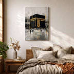Elegant Kaaba wall art featuring the Holy Kaaba adorned with gold detailing, surrounded by worshippers in a textured abstract composition. Neutral black, gold, and ivory tones create a sophisticated Islamic canvas perfect for prayer rooms, living spaces, and Muslim home decor.