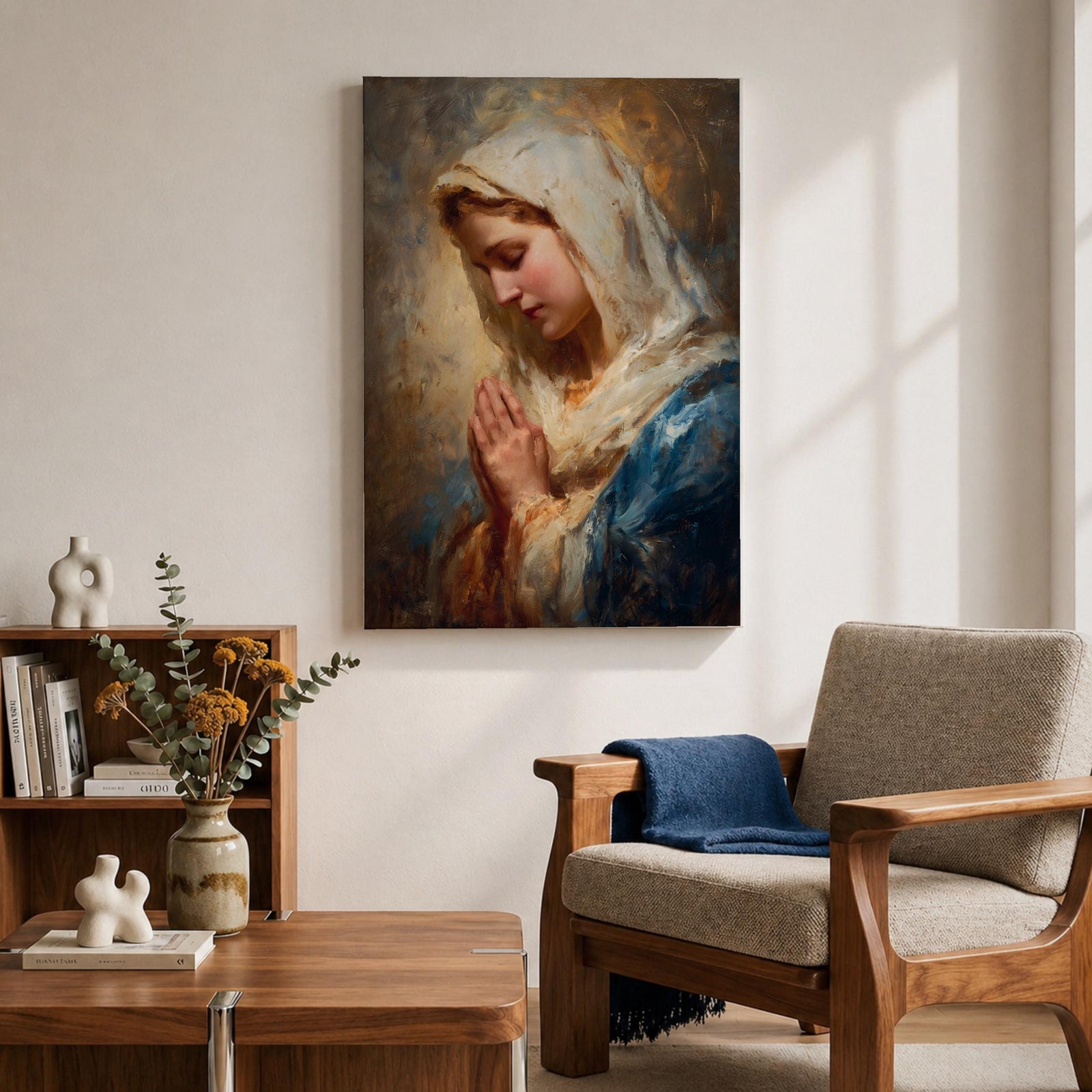 Sacred Catholic wall art featuring the Virgin Mary in prayer with hands clasped and eyes gently lowered. Soft golden light illuminates her serene expression, while rich blue garments and impressionist brushwork create a timeless devotional portrait ideal for prayer rooms and Christian homes.
