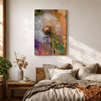 Close-up of a dandelion seed head with fine white filaments against a colorful abstract background featuring warm tones of orange, purple, and green, rendered in an abstract botanical style on a framed canvas.