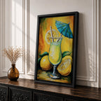 Vibrant lemon cocktail wall art featuring a refreshing citrus drink in a stemmed glass with lemon slices, a straw, and a blue cocktail umbrella. This abstract impasto-style painting uses bright yellow, green, and blue tones, creating a cheerful tropical atmosphere for kitchens, dining rooms, bars, and entertaining spaces.