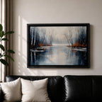 A framed canvas painting depicting a serene winter lake landscape with bare trees reflected in still water. The scene features a quiet woodland setting with leafless trees and subtle earthy tones, capturing the calm and reflective nature of a winter forest by the lake.