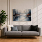 A framed canvas painting depicting a serene winter lake landscape with bare trees reflected in still water. The scene features a quiet woodland setting with leafless trees and subtle earthy tones, capturing the calm and reflective nature of a winter forest by the lake.