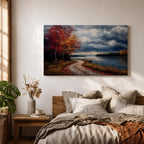 A framed canvas painting depicting an autumn landscape with a winding path along a riverbank, bordered by trees with vibrant fall foliage. The scene captures a moody sky with clouds, rendered in a vintage style emphasizing texture and rich colors.