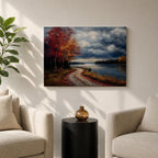 A framed canvas painting depicting an autumn landscape with a winding path along a riverbank, bordered by trees with vibrant fall foliage. The scene captures a moody sky with clouds, rendered in a vintage style emphasizing texture and rich colors.
