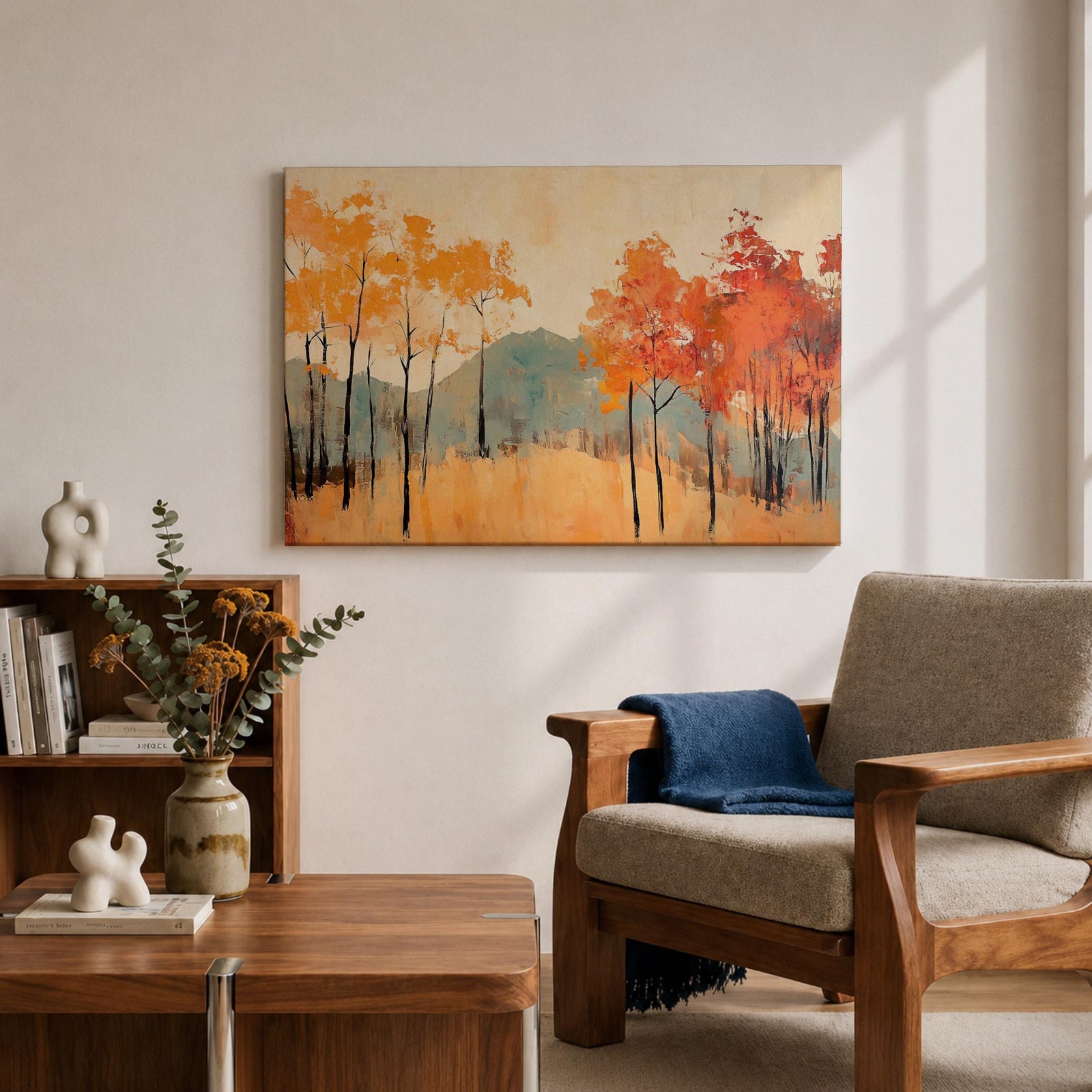 A framed abstract painting of an autumn forest landscape featuring tall slender trees with orange and red foliage and a muted mountain backdrop. The composition uses textured brush strokes to create a modern impression of fall trees in a natural setting.