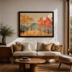 A framed abstract painting of an autumn forest landscape featuring tall slender trees with orange and red foliage and a muted mountain backdrop. The composition uses textured brush strokes to create a modern impression of fall trees in a natural setting.