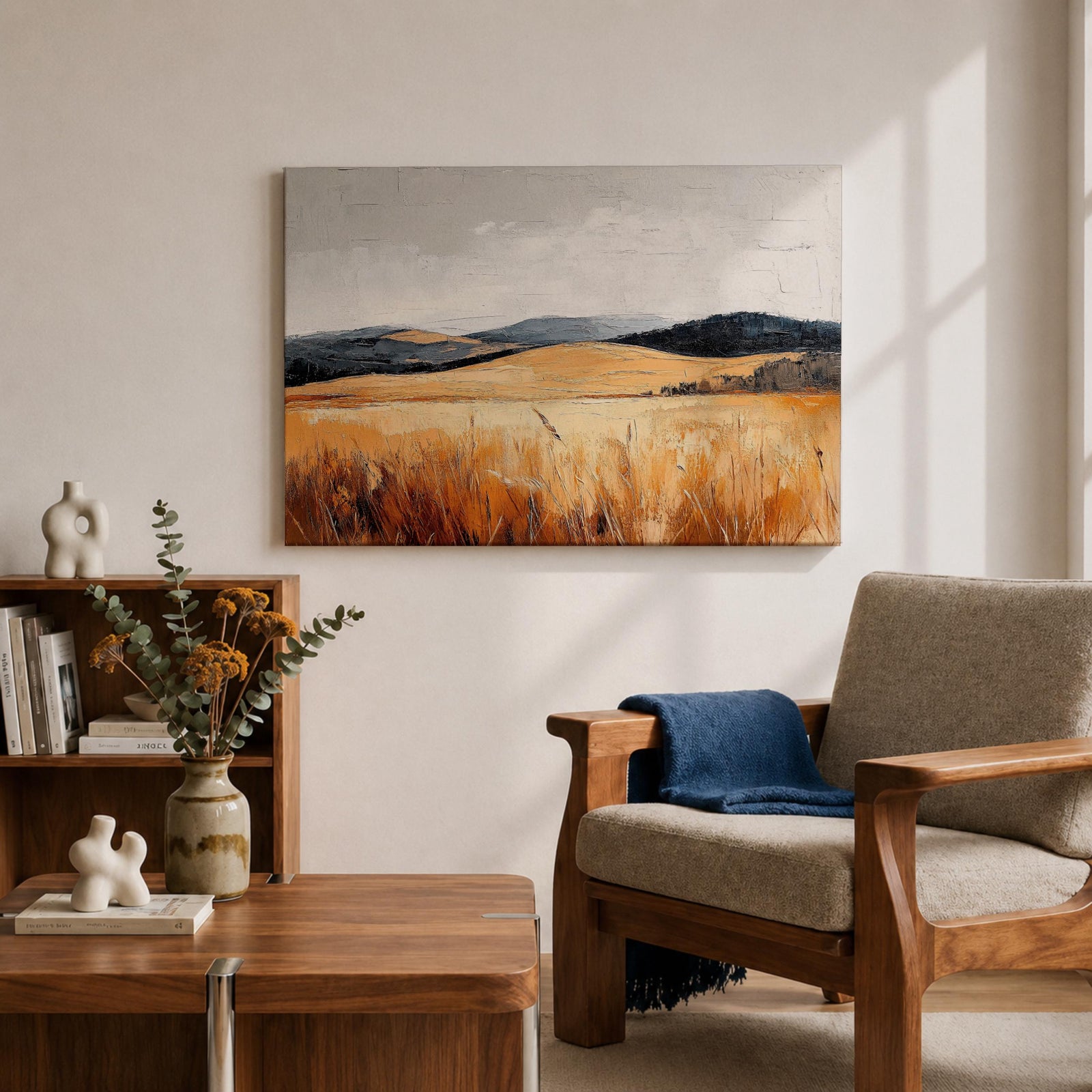A vintage-style framed canvas painting depicting a vast landscape of golden fields and rolling hills under a muted sky. The textured brushstrokes emphasize the natural prairie scene with tall grasses in the foreground and distant hills, capturing a serene rural environment.