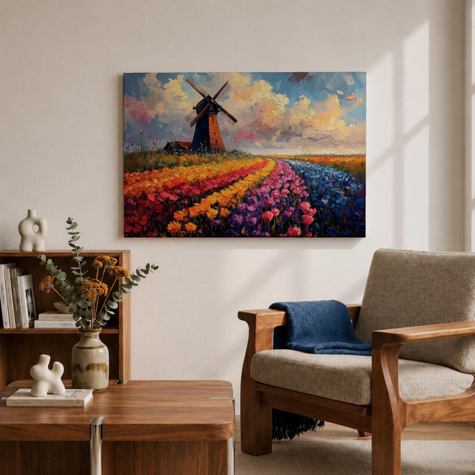 This impasto style painting depicts a classic windmill standing beside vibrant rows of tulip fields stretching into the horizon under a dynamic sky. The textured brushstrokes emphasize the colorful floral landscape and the iconic Dutch countryside scene.
