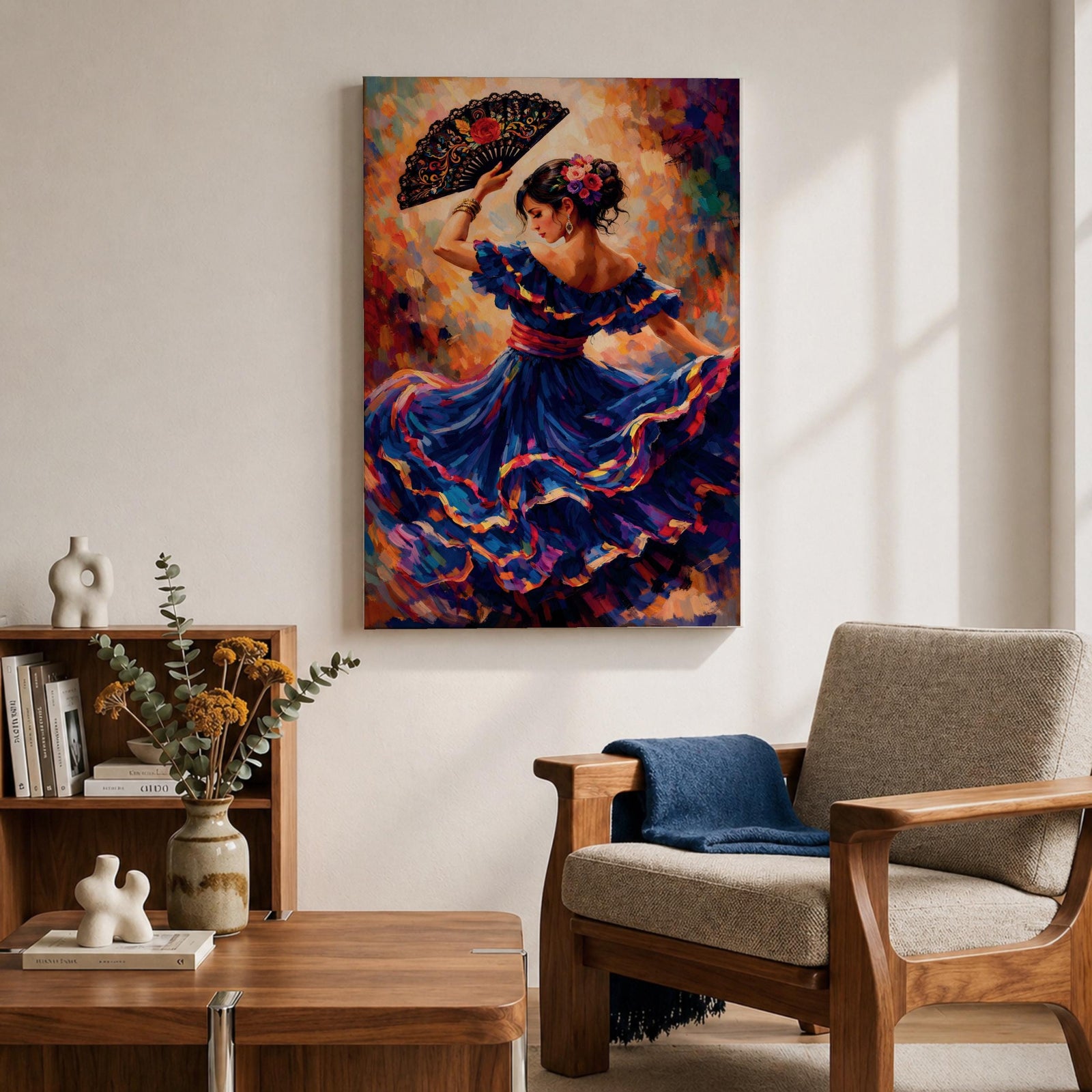 A flamenco dancer in a flowing blue dress moves gracefully with one arm raised holding an ornate fan, her skirt swirling in layered motion with vivid brushstrokes of red, gold, and violet, while her floral hairpiece and poised posture enhance the sense of rhythm and expressive movement in a richly textured composition.