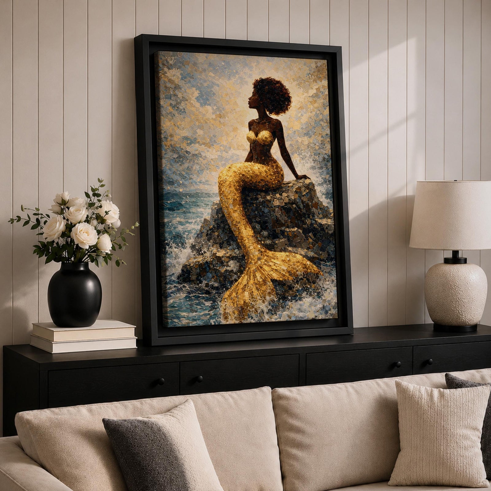 A stylized mermaid depicted as a Black woman with a voluminous afro sits gracefully on ocean rocks, her shimmering gold tail flowing into textured waves, rendered in a mosaic-like painterly style with luminous highlights and layered brushwork that captures movement of water, light, and the serene coastal atmosphere.