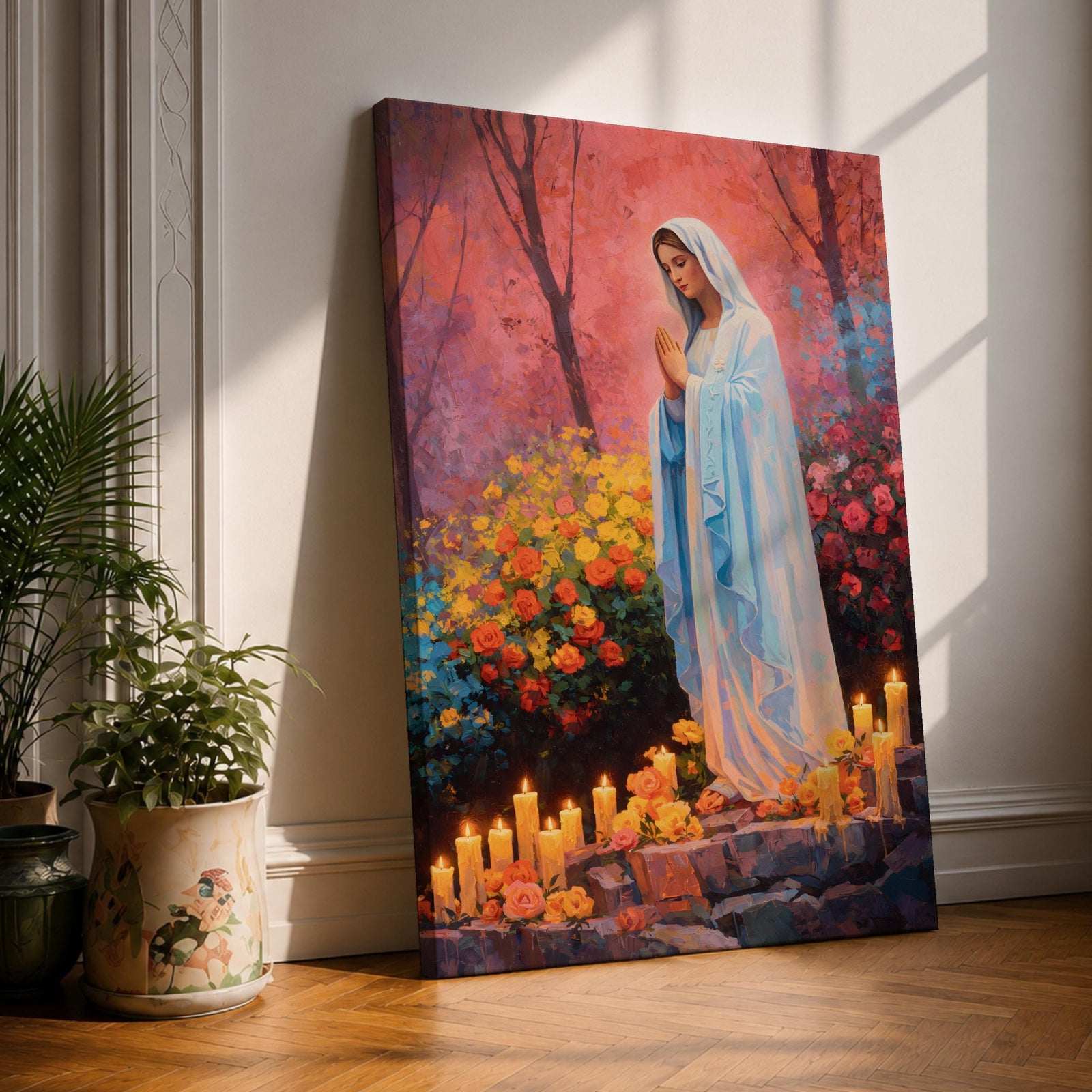 A detailed painting of Our Lady of Lourdes depicts the Virgin Mary standing with hands clasped in prayer, surrounded by blooming flowers and lit candles. The image captures a serene religious scene symbolizing the Marian apparition, rendered in a realistic style with vibrant colors and soft shading.