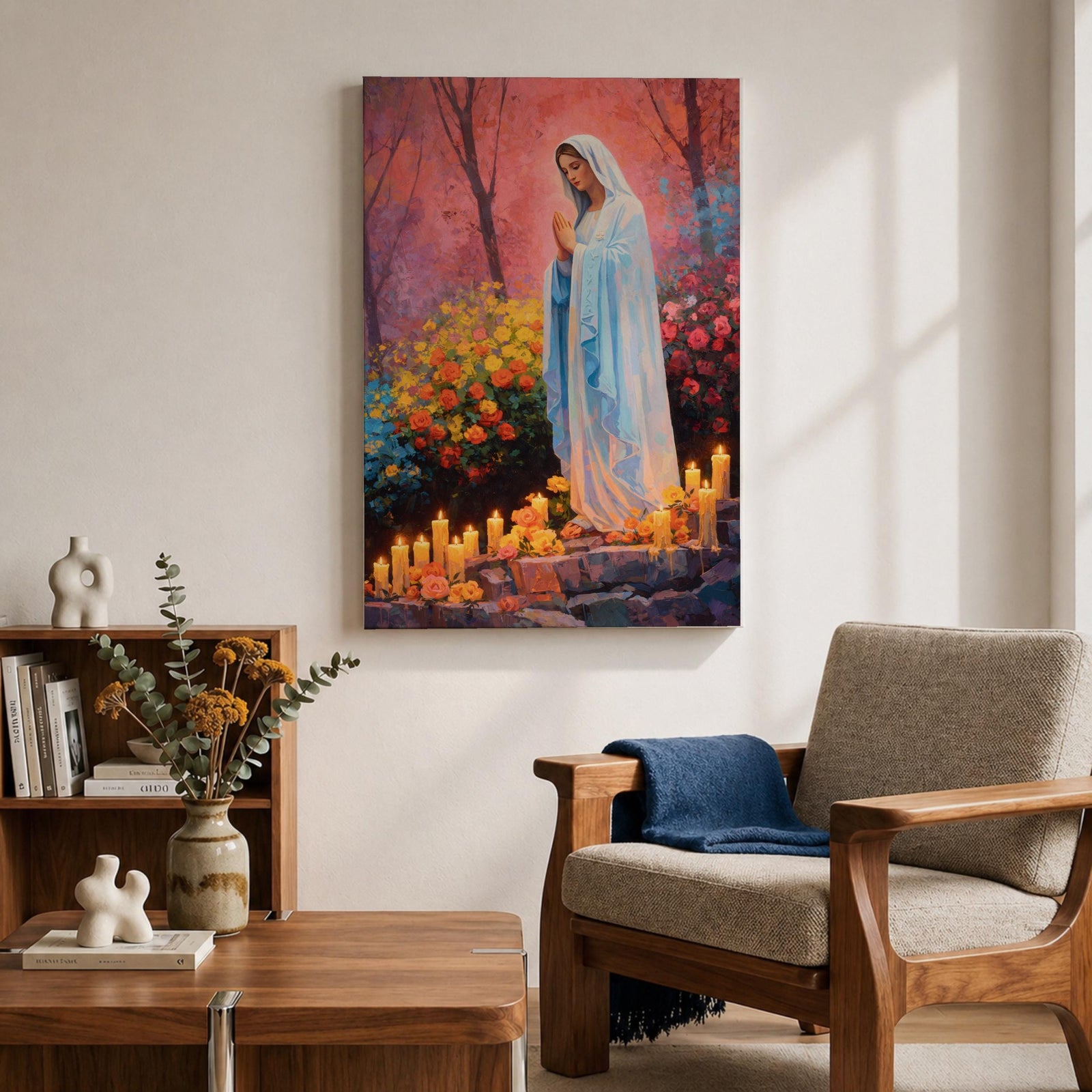 A detailed painting of Our Lady of Lourdes depicts the Virgin Mary standing with hands clasped in prayer, surrounded by blooming flowers and lit candles. The image captures a serene religious scene symbolizing the Marian apparition, rendered in a realistic style with vibrant colors and soft shading.