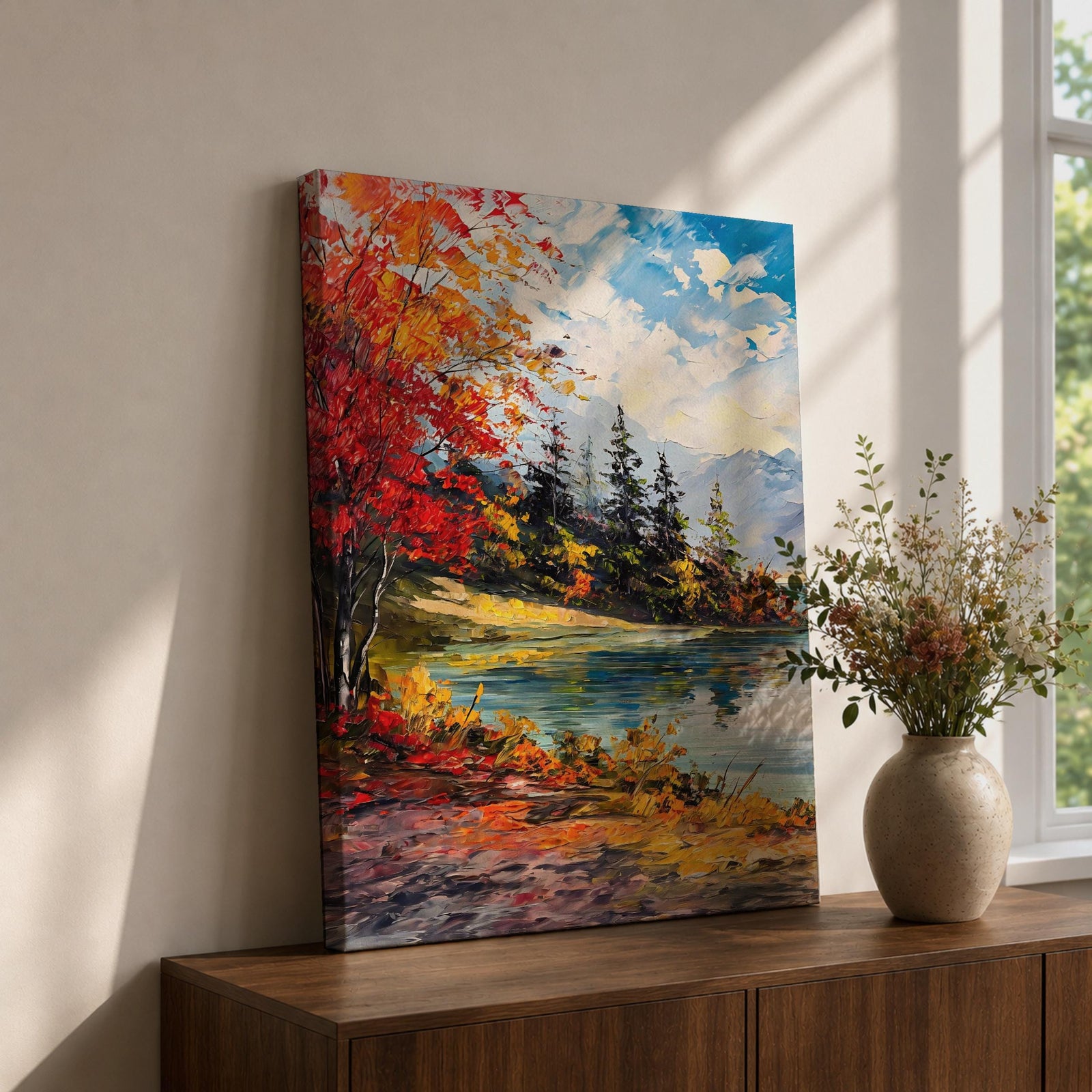 A vibrant impasto painting depicting an autumn lake scene with colorful red and orange foliage on the shore, evergreen trees, and distant mountains under a partly cloudy blue sky, rendered with thick textured brushstrokes creating a rich, dynamic landscape composition.