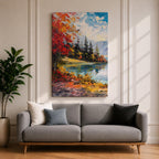 A vibrant impasto painting depicting an autumn lake scene with colorful red and orange foliage on the shore, evergreen trees, and distant mountains under a partly cloudy blue sky, rendered with thick textured brushstrokes creating a rich, dynamic landscape composition.