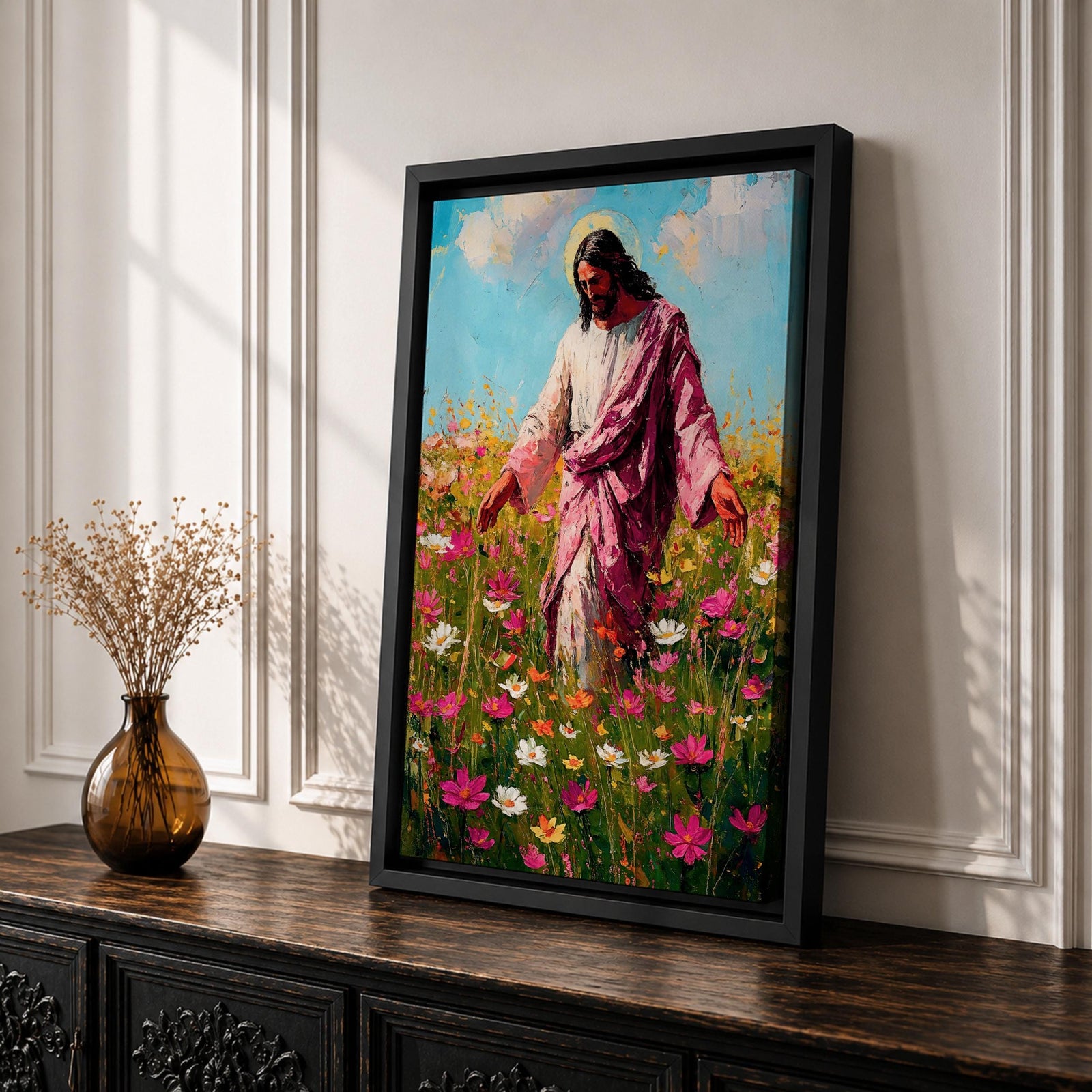 Painting of Jesus Christ walking through a field of blooming wildflowers with arms gently extended while wearing flowing robes and a soft halo behind his head. The scene shows Christ moving among colorful blossoms beneath a bright sky, rendered with expressive painterly brushstrokes that emphasize a peaceful pastoral setting.