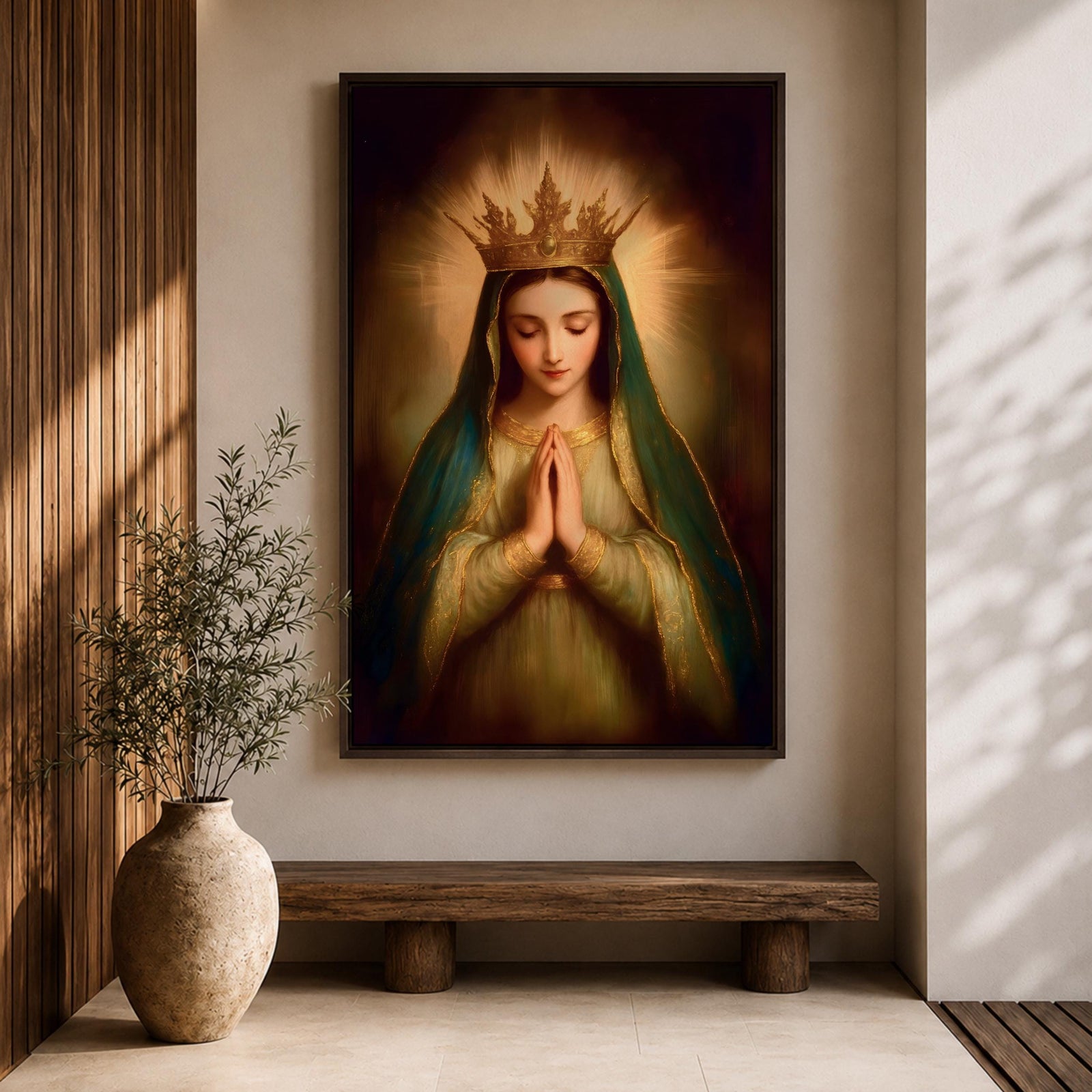 Painting of the Virgin Mary crowned as Queen of Heaven with a radiant golden crown and halo, shown with eyes closed and hands gently folded in prayer. She wears a long veil and flowing robe while soft classical brushwork and a glowing background emphasize the Marian figure in a devotional royal portrait.