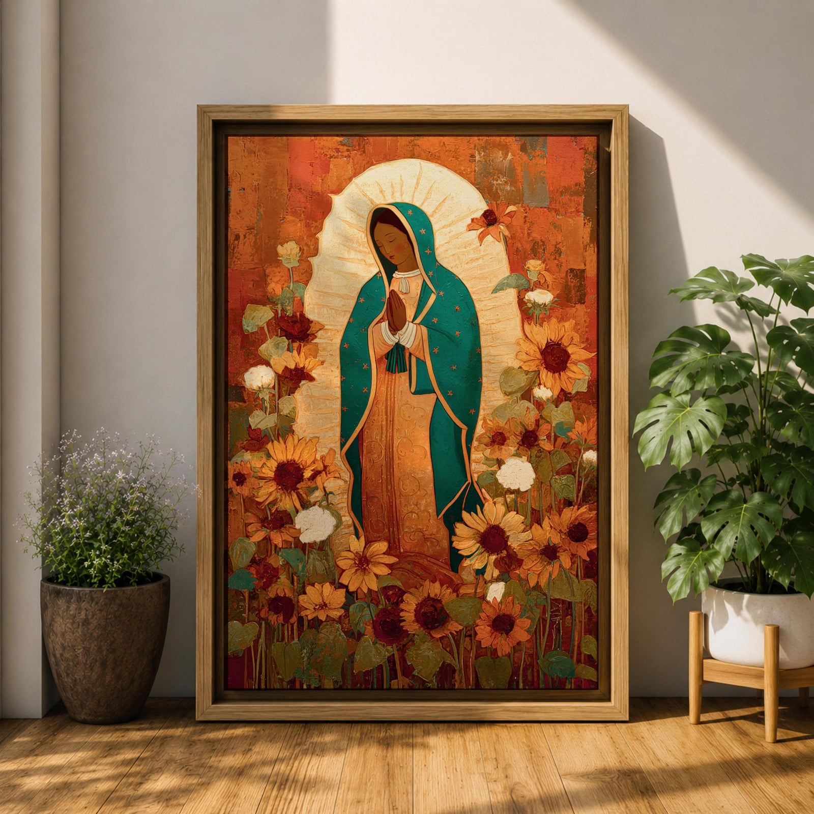 This artwork depicts Our Lady of Guadalupe, also known as the Virgin of Guadalupe, surrounded by vibrant sunflowers and floral elements in a vintage style. The figure is shown with hands clasped in prayer, wearing a teal mantle adorned with stars, set against a warm textured background.