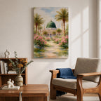 Framed canvas wall art of the Prophet’s Mosque in Medina featuring the iconic green dome, surrounded by palm trees and blooming pink flowers along a sunlit garden path, creating a peaceful and serene Islamic landscape scene for home decor.