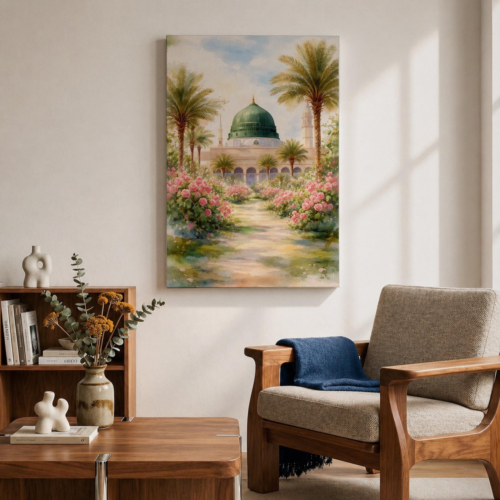 Framed canvas wall art of the Prophet’s Mosque in Medina featuring the iconic green dome, surrounded by palm trees and blooming pink flowers along a sunlit garden path, creating a peaceful and serene Islamic landscape scene for home decor.