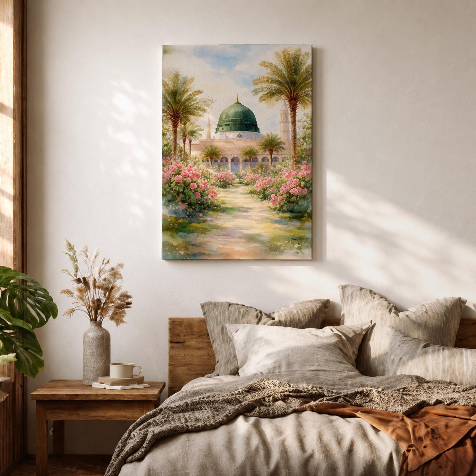 Framed canvas wall art of the Prophet’s Mosque in Medina featuring the iconic green dome, surrounded by palm trees and blooming pink flowers along a sunlit garden path, creating a peaceful and serene Islamic landscape scene for home decor.