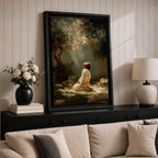 Framed artwork of Jesus praying in the Garden of Gethsemane, kneeling beneath a tree as soft rays of light shine down from above. Set in a modern living room, the canvas rests on a wooden console beside plants and neutral decor.