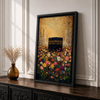 The Kaaba stands at the center of a vibrant field of multicolored flowers, surrounded by softly rendered mosque minarets in the background, set beneath a radiant golden sky with textured brushwork that blends architectural form with blooming botanical elements in a richly layered and luminous composition.