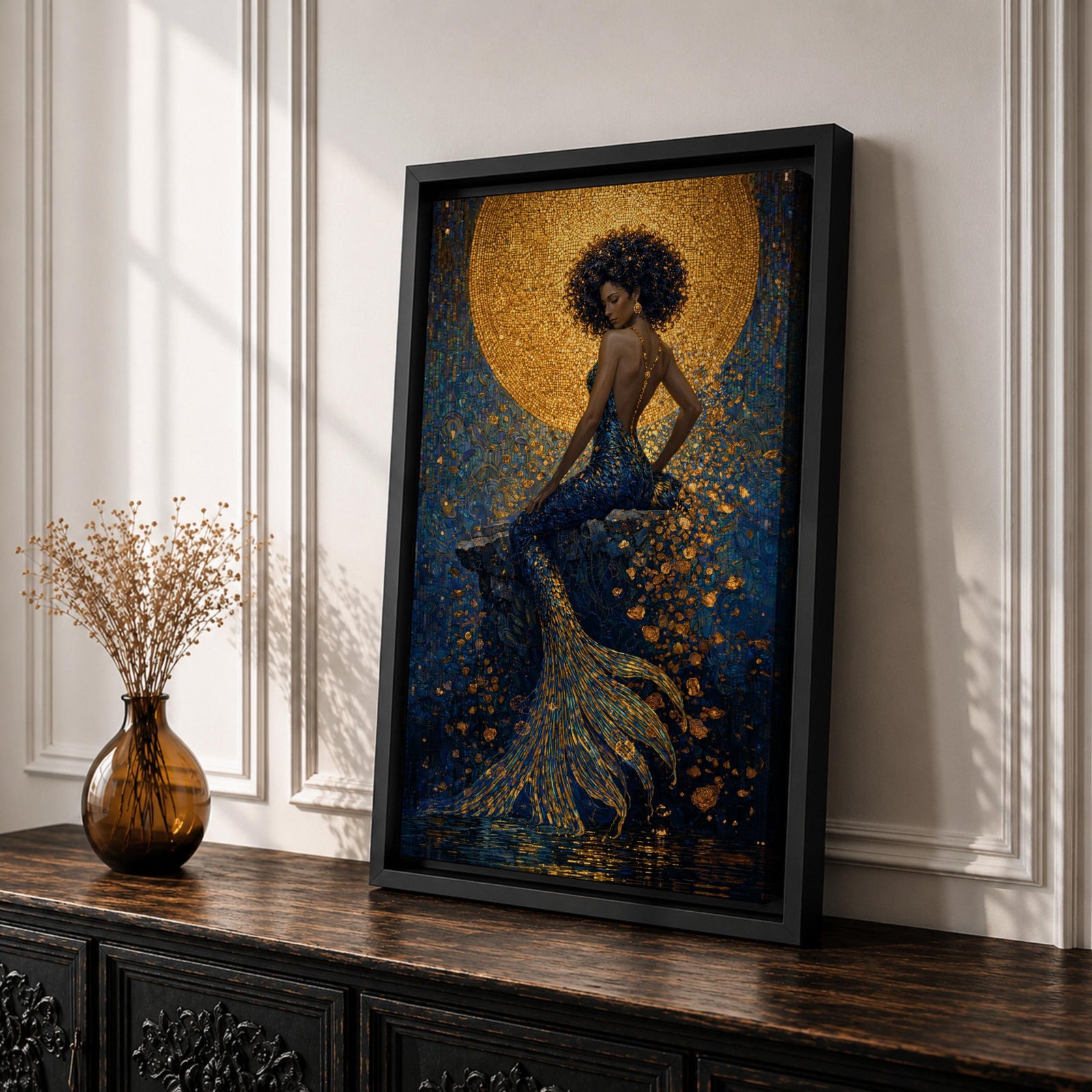 A striking fantasy painting of a Black mermaid seated gracefully with her back turned, her voluminous afro illuminated by a glowing golden moon behind her, while her long textured tail flows downward in shimmering gold and deep blue tones, surrounded by abstract ocean textures that create a rich and luminous underwater composition.