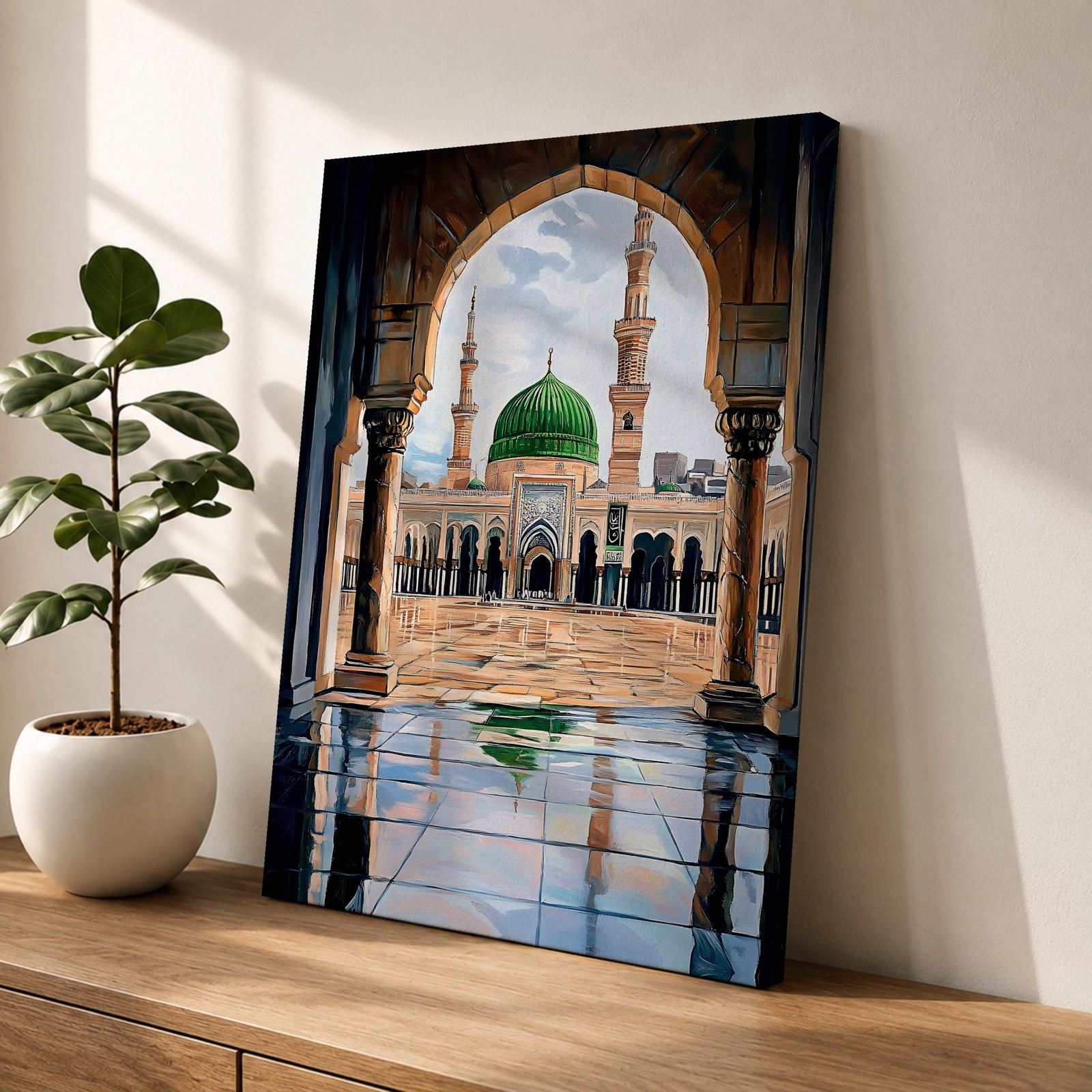 Artwork showing the courtyard of Al-Masjid an-Nabawi viewed through a carved Islamic arch, featuring the iconic green dome of the Prophet’s Mosque with tall minarets, reflective marble floor, and bright sky above the sacred mosque complex in Medina.