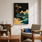 A framed canvas artwork depicting a mountain landscape with abstract golden and teal elements. The composition features stylized mountains, a flowing river, and a tall tree with birds flying above, rendered in an abstract style with rich gold and blue tones against a dark background.