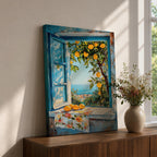 A vibrant framed canvas painting depicting a lemon tree bursting with ripe yellow lemons viewed through an open blue window overlooking a coastal Mediterranean scene. The artwork captures lush green leaves, a floral cloth on the windowsill, and a distant sea horizon in a realistic natural style.