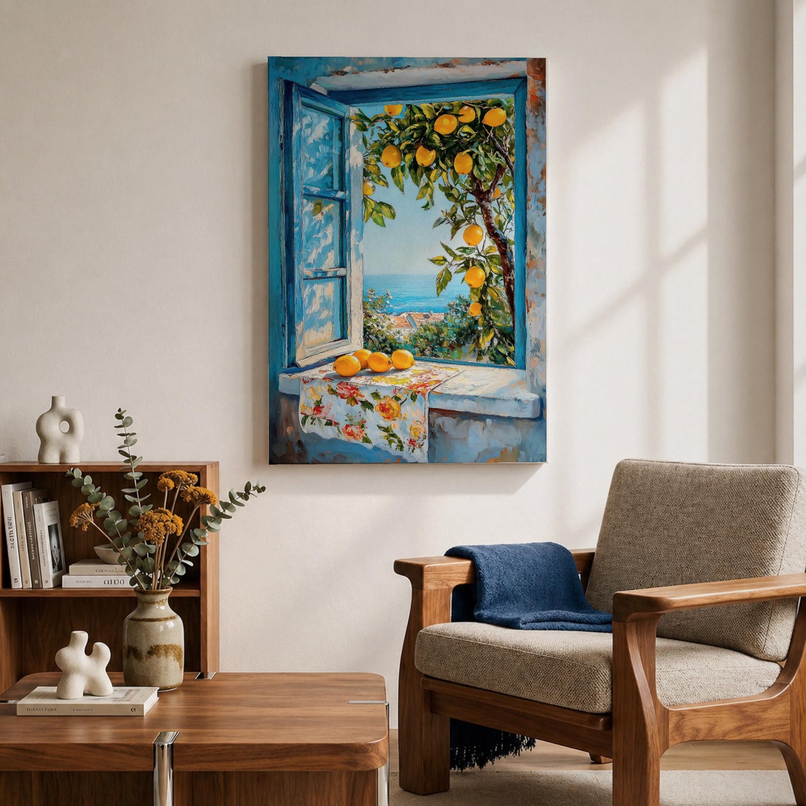 A vibrant framed canvas painting depicting a lemon tree bursting with ripe yellow lemons viewed through an open blue window overlooking a coastal Mediterranean scene. The artwork captures lush green leaves, a floral cloth on the windowsill, and a distant sea horizon in a realistic natural style.