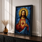 A stained glass style depiction of the Sacred Heart of Jesus shows Jesus with long hair and beard, wearing a red robe and blue cloak. His heart is radiant with light, crowned with a cross and surrounded by thorns. The background features geometric blue and gold stained glass tiles forming a halo.