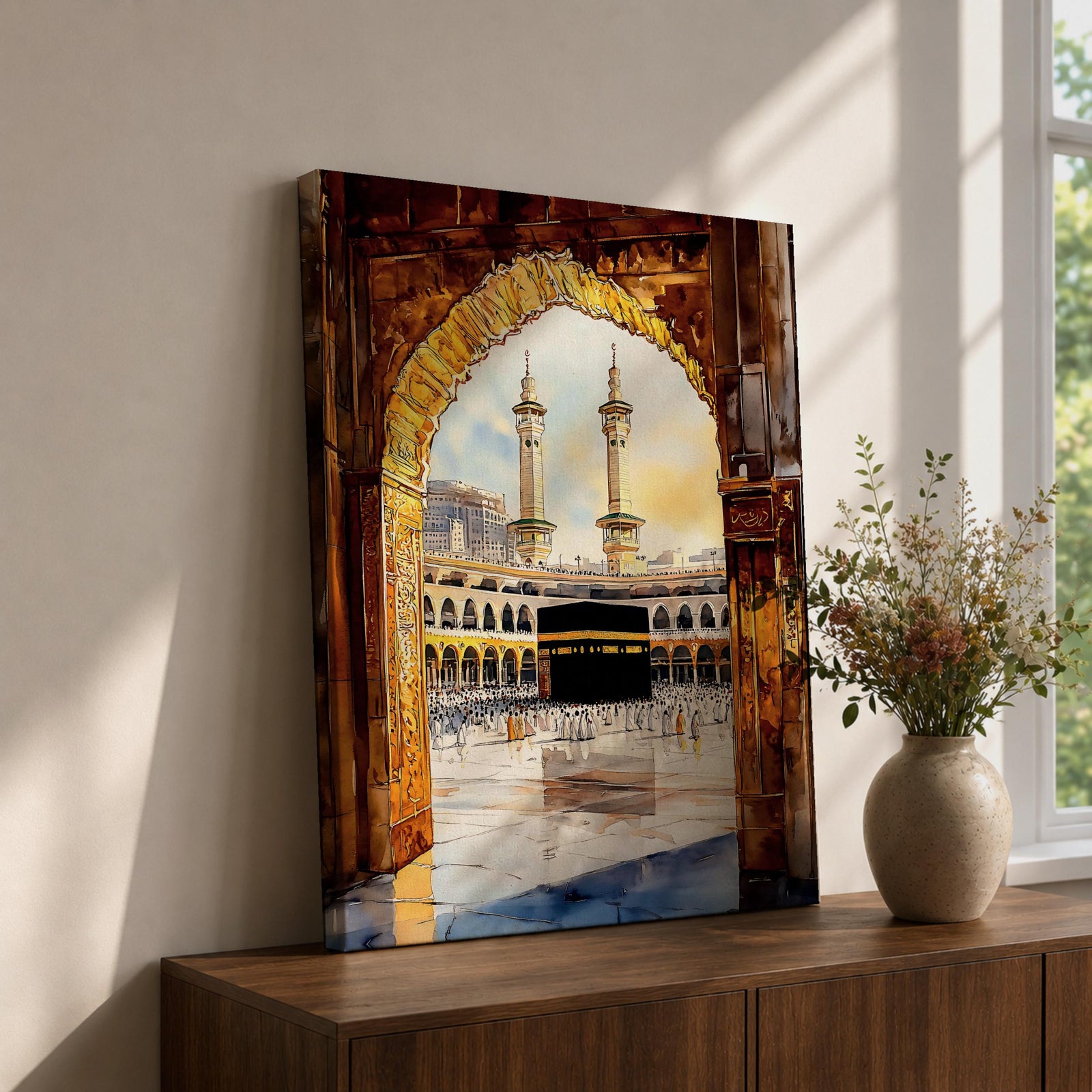 Watercolor-style painting of the Kaaba in Masjid al-Haram viewed through a golden mosque archway, with pilgrims gathered around the sacred black Kaaba in the courtyard of Mecca and two tall minarets rising above the holy mosque complex.
