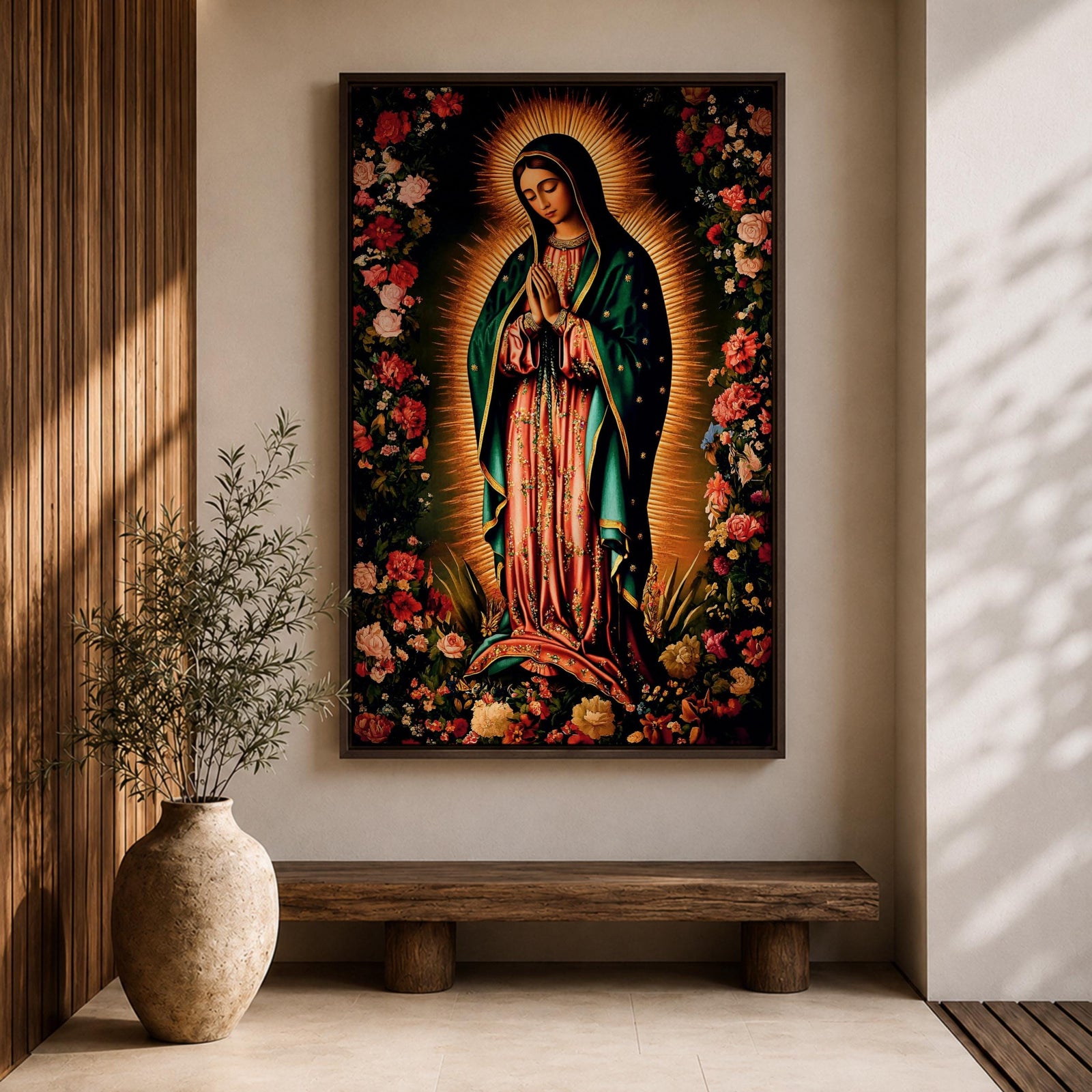 A detailed framed canvas print depicting Our Lady of Guadalupe, showing the Virgin of Guadalupe surrounded by a floral border with radiant light emanating behind her, rendered in a traditional Mexican religious art style with vivid colors and intricate floral patterns.