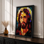 A stained glass mosaic portrait of Jesus Christ featuring vibrant glass fragments in warm tones with a halo behind his head. The artwork uses geometric shapes and rich colors typical of stained glass style, capturing a solemn and iconic religious figure in a mosaic-like composition.