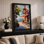 A vibrant Mediterranean café scene featuring a cozy outdoor patio with tables and chairs, colorful flowers cascading from balconies, and a distant view of the sea. The artwork captures a lively coastal atmosphere with impressionistic brushstrokes and rich textures, evoking a warm and inviting cityscape.