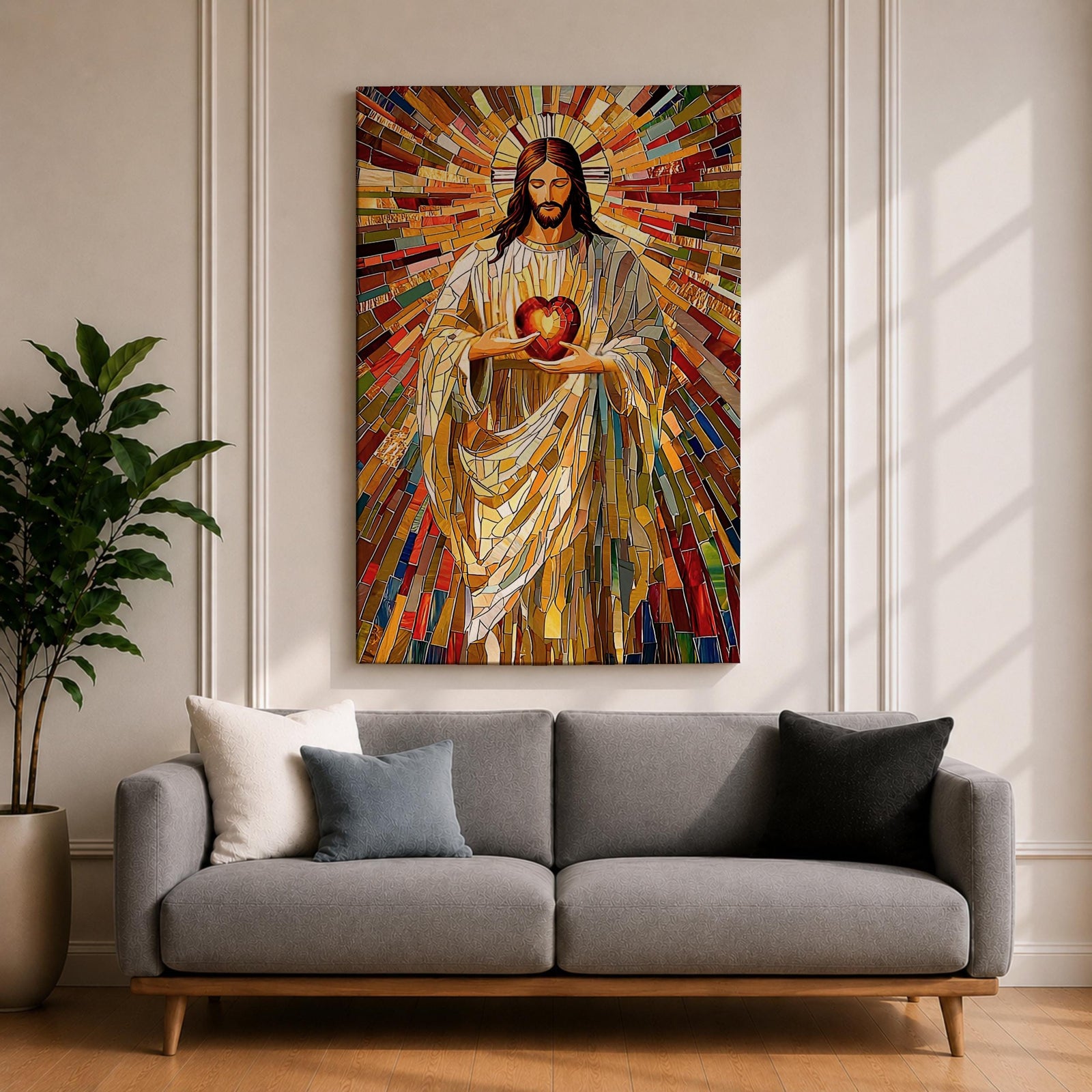 A vibrant mosaic stained glass style artwork depicting the Sacred Heart of Jesus holding a glowing heart. The image features intricate geometric glass fragments in warm tones radiating outward, emphasizing the central figure with flowing robes and a halo behind his head, rendered in a religious mosaic style.