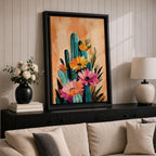 A vibrant watercolor painting featuring a cluster of cacti adorned with large blooming flowers in a boho style. The composition highlights desert flora with detailed brushwork and soft washes of color, creating a fresh and natural floral artwork perfect for botanical-themed decor.