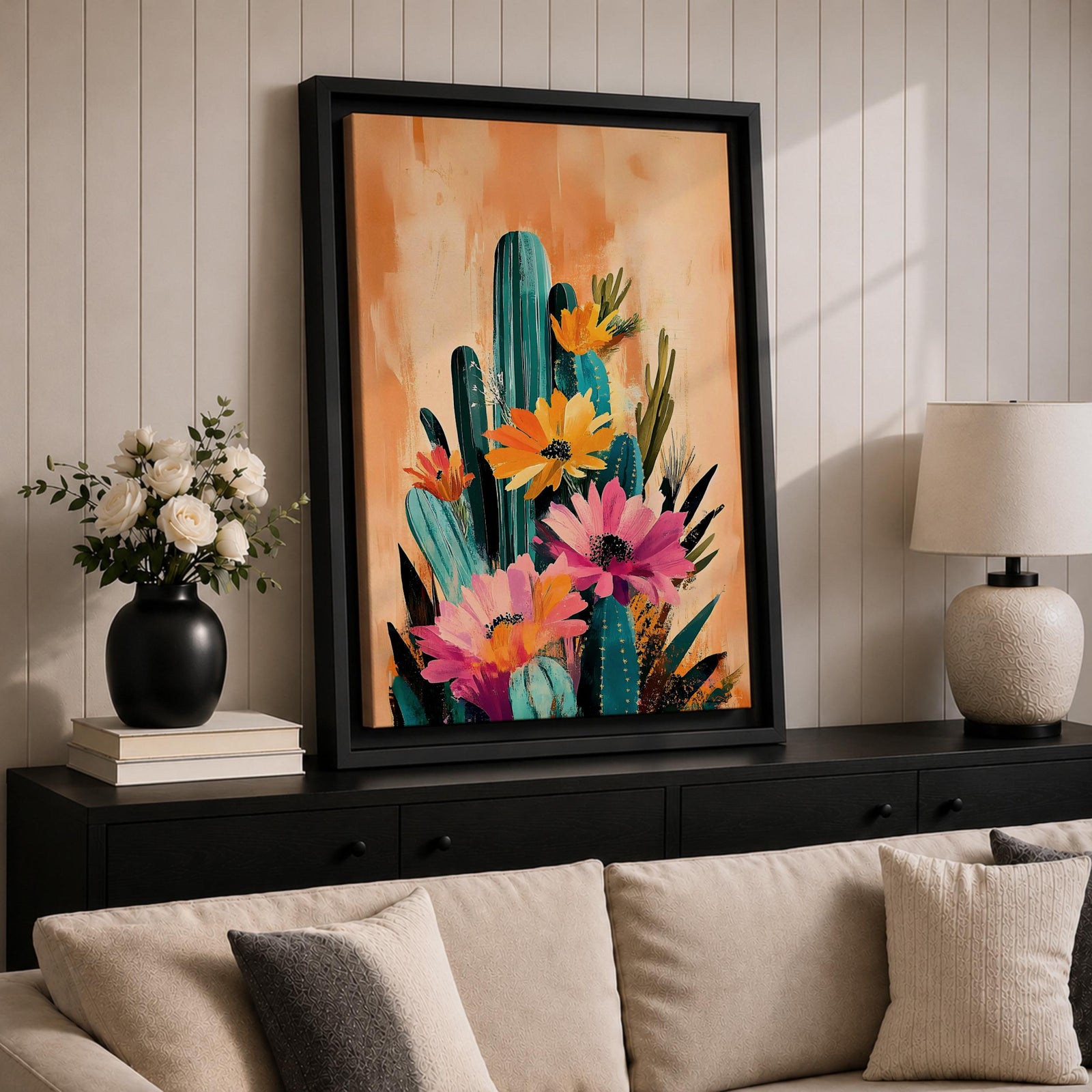 A vibrant watercolor painting featuring a cluster of cacti adorned with large blooming flowers in a boho style. The composition highlights desert flora with detailed brushwork and soft washes of color, creating a fresh and natural floral artwork perfect for botanical-themed decor.