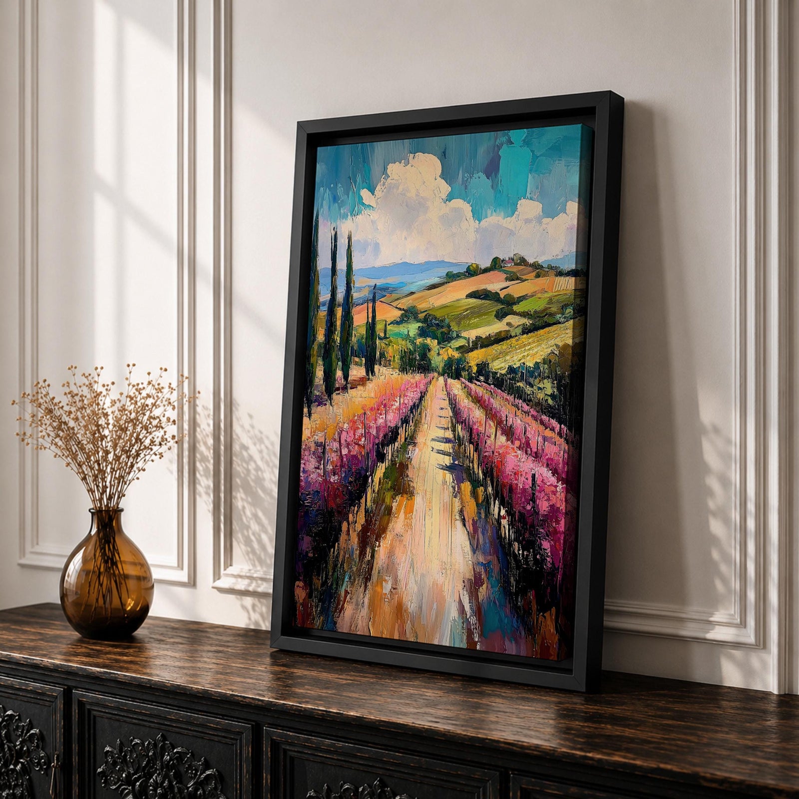 This impasto style oil painting depicts a vineyard landscape with rows of grapevines stretching into the distance under a partly cloudy sky. The textured brushstrokes create depth and vibrancy, highlighting the rolling hills and tall cypress trees characteristic of a country vineyard scene.